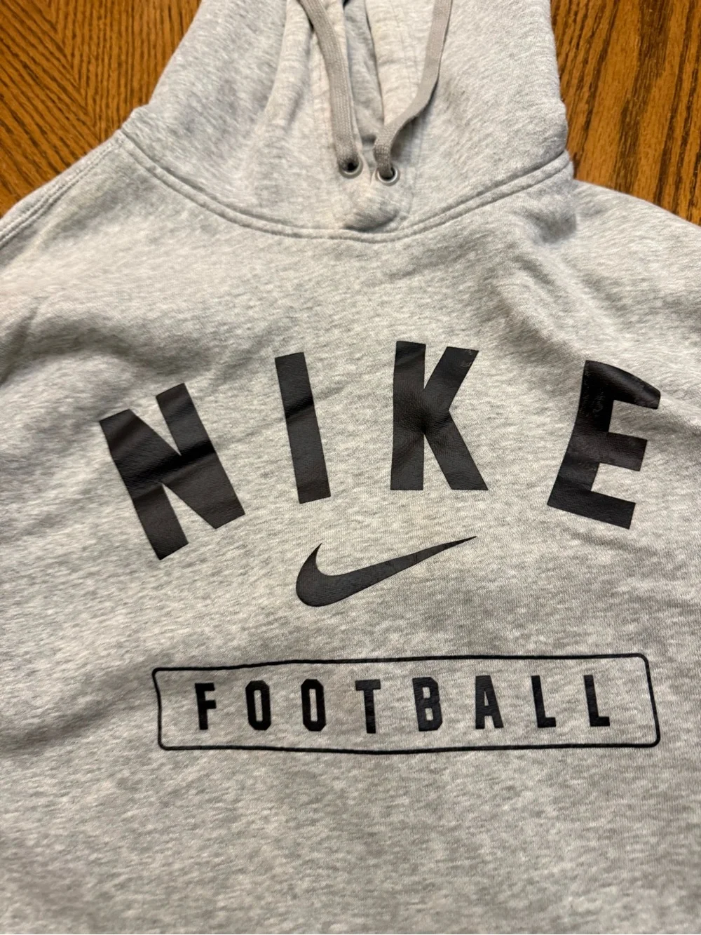 Nike Light Gray Pullover Hoodie with NIKE FOOTBALL Graphic